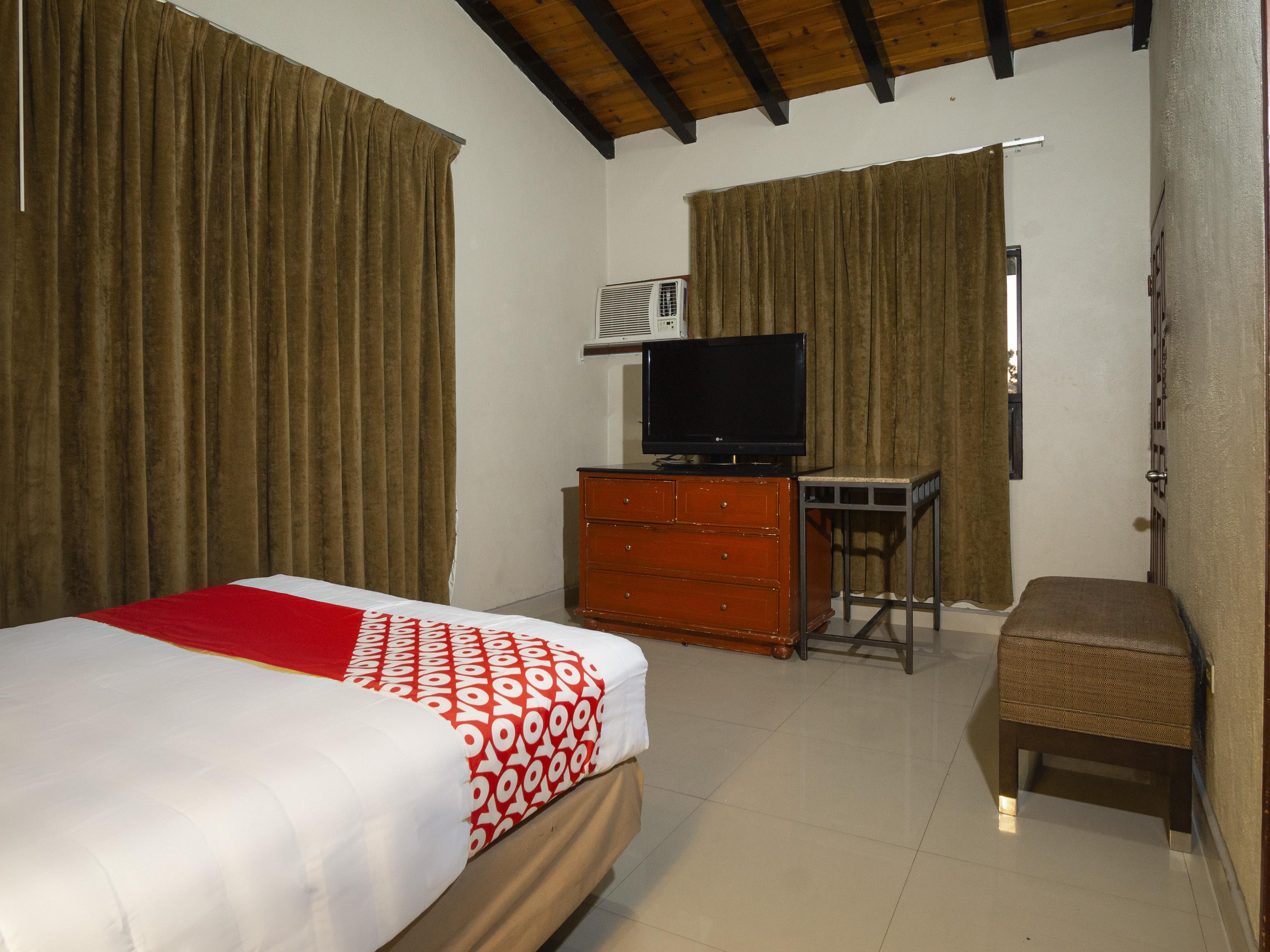 Oyo Hotel Hacienda Don Luis, 罗萨里托 外观 照片 A bedroom at the hotel
