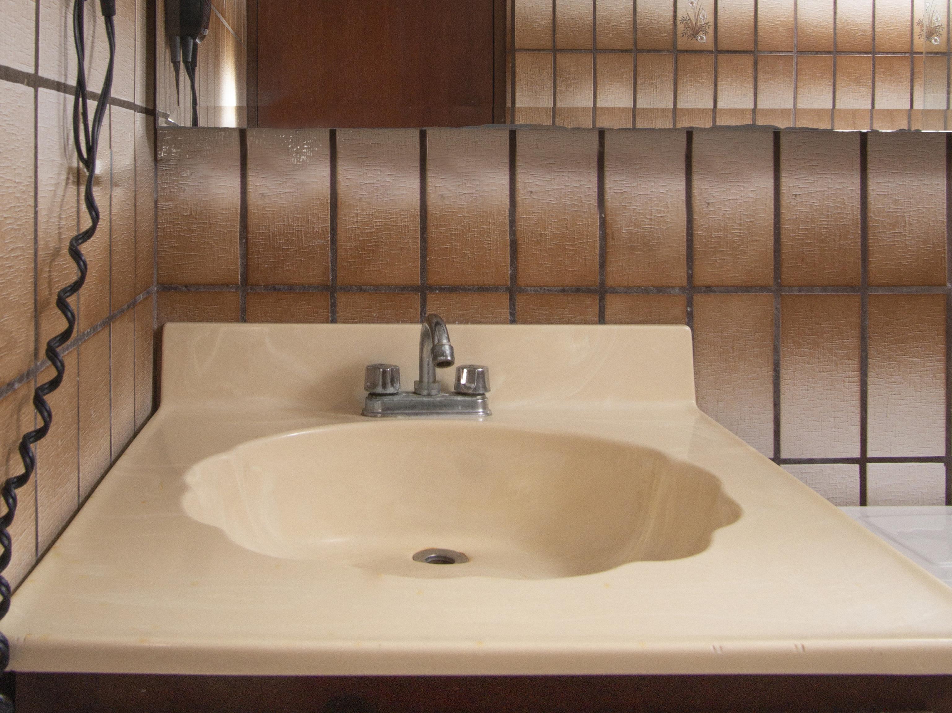 Oyo Hotel Hacienda Don Luis, 罗萨里托 外观 照片 A typical American bathroom sink